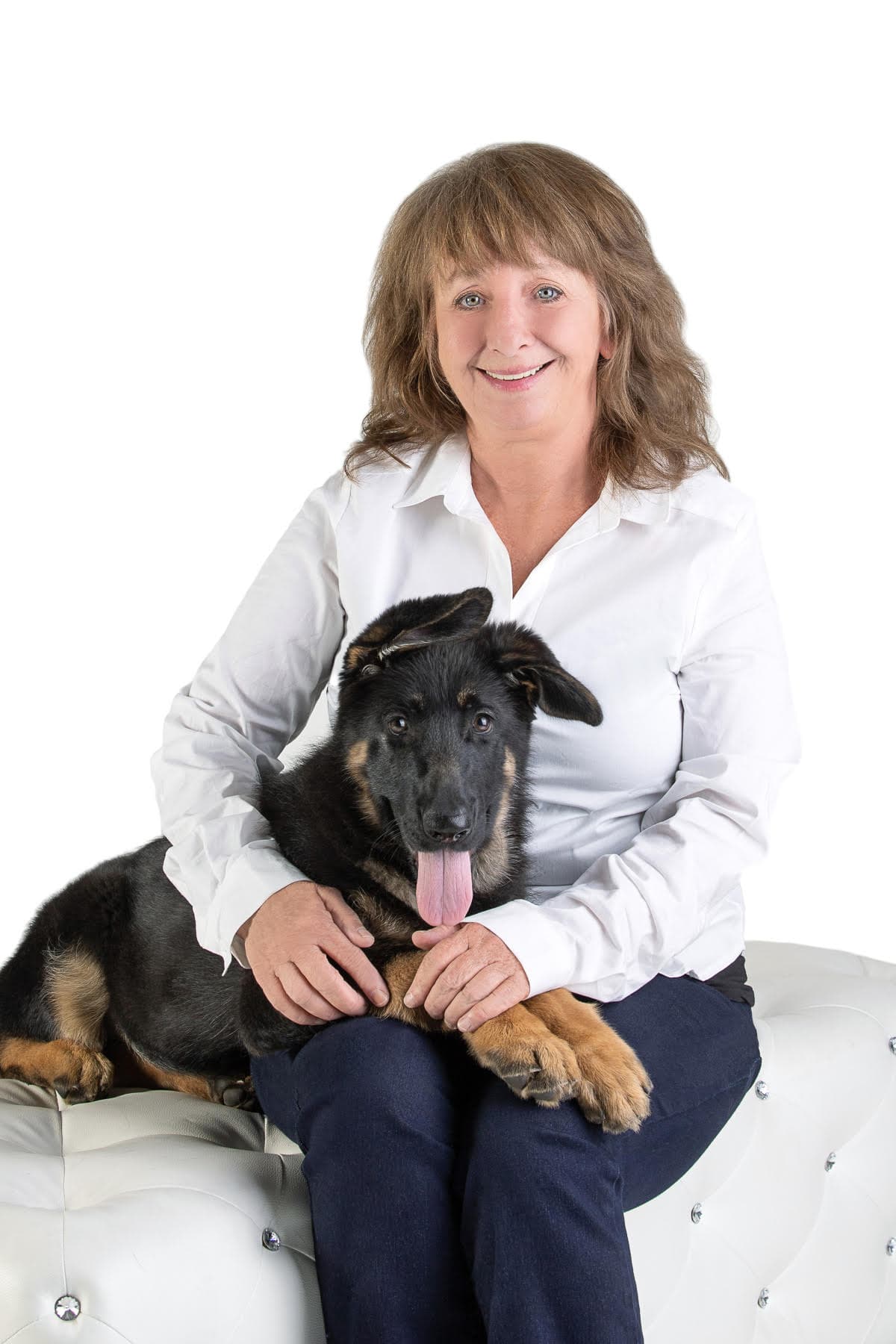Carrie with a German Shepherd puppy